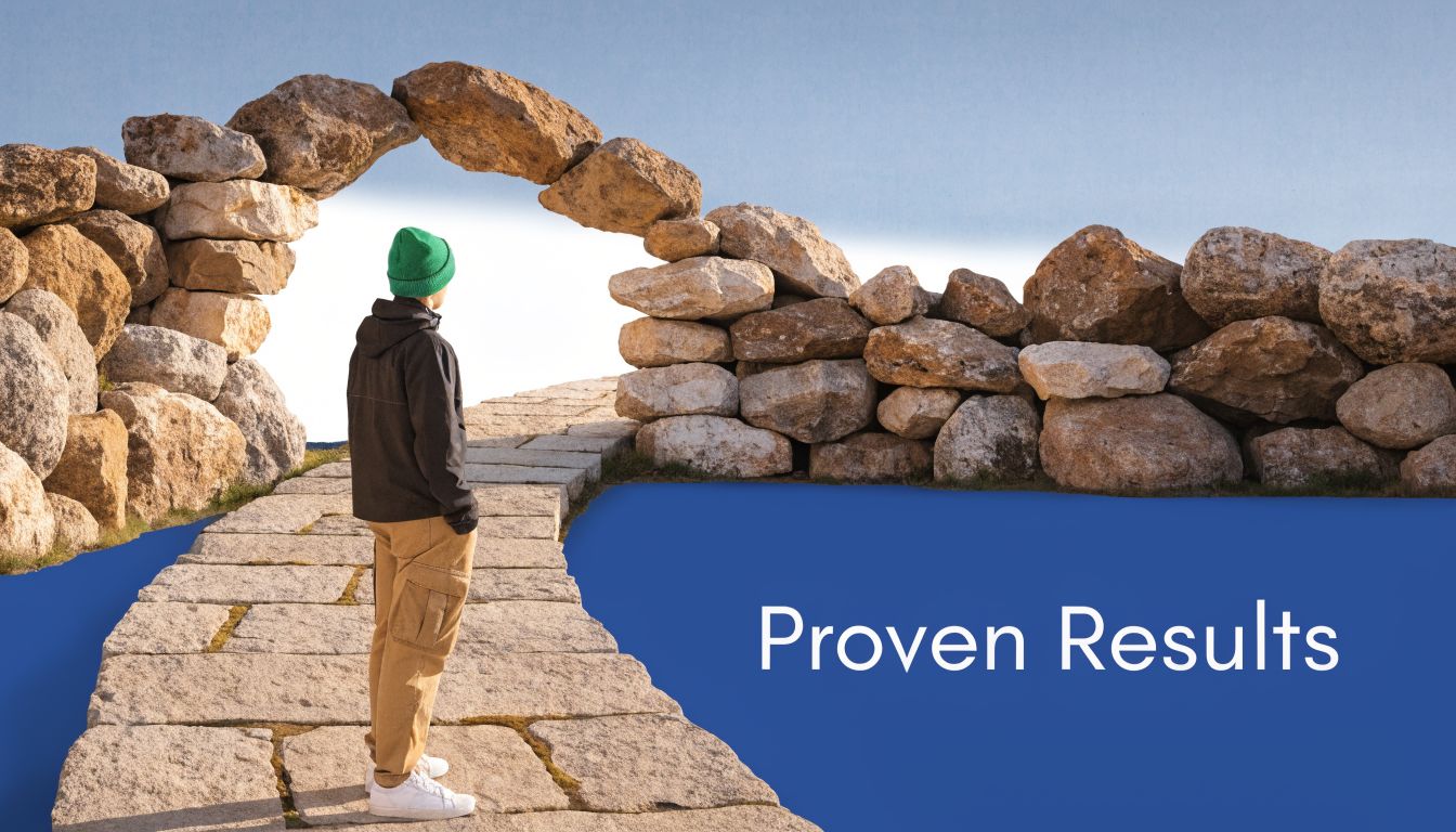 A person standing on a stone path looking towards a bright archway representing success and growth.