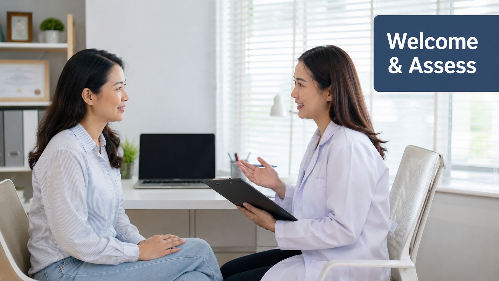 A smiling doctor in a white coat consults with a patient during a clinical office visit.